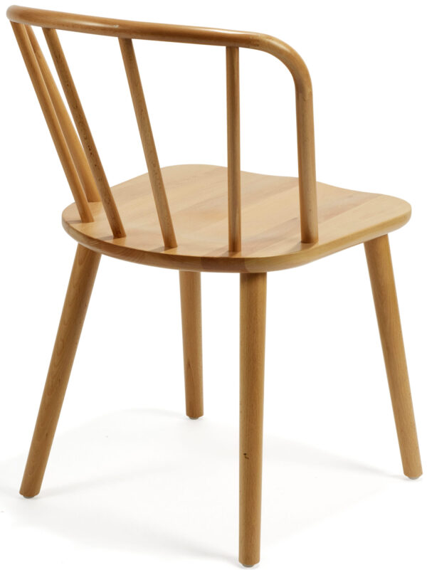 The Spoke Chair is shown from the back, showcasing its simple, modern design. It features a light finish with a slightly curved backrest composed of three vertical slats and stands on four straight legs. The chair also has a flat, rectangular seat.