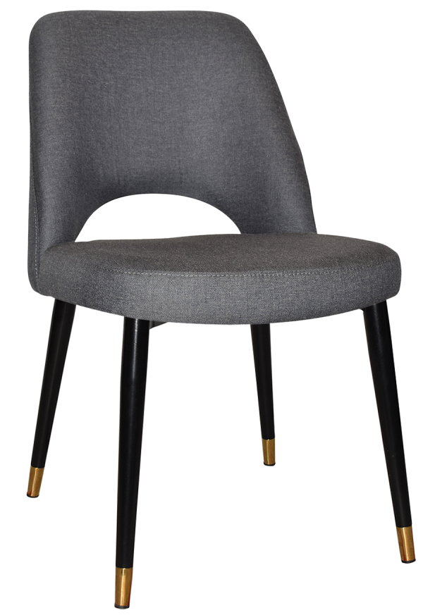 The Albury Black Brass Metal Leg Chair is a modern piece showcasing a gray upholstered backrest and seat, accentuated by a curved cutout at the lower back. It stands on four black legs, each tipped with gold-colored accents, offering a sleek and contemporary design ideal for various interior settings.