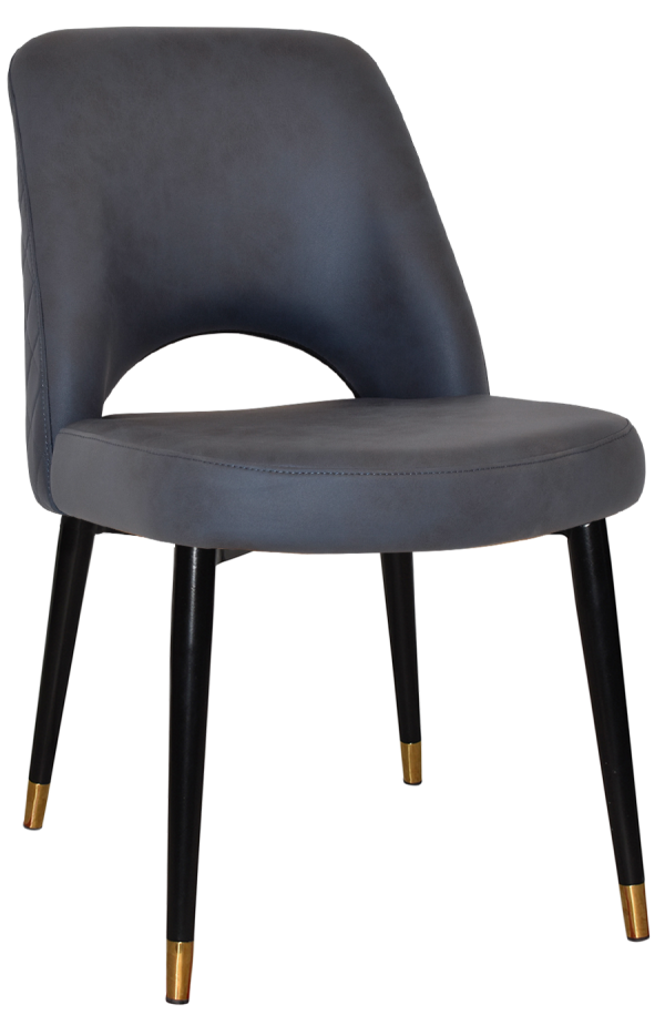 The Albury Black Brass Metal Leg Chair is a modern piece with a smooth, dark gray upholstered backrest and seat. It features a distinctive cut-out back and stands on four slim black legs with gold-toned caps at the bottom.