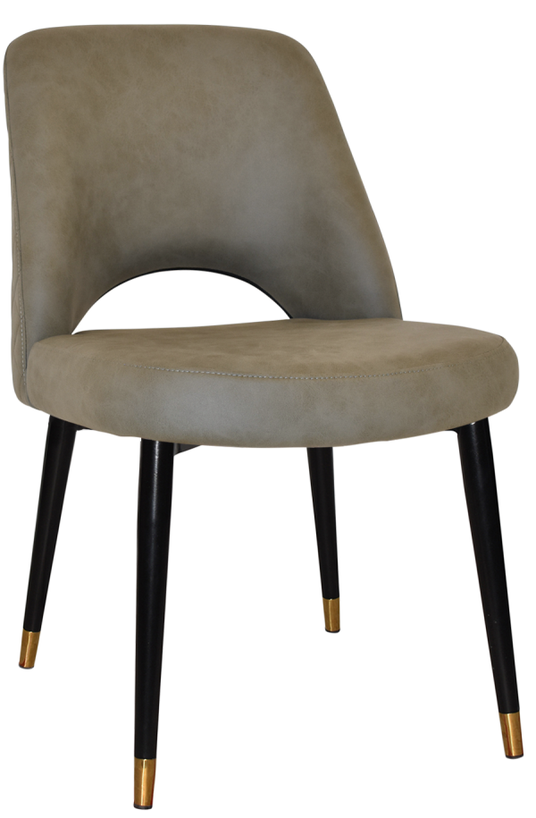 The Albury Black Brass Metal Leg Chair is a modern, armless chair featuring a curved backrest and muted beige upholstery. The cushioned seat complements its black, tapered legs with gold tips. This sleek and contemporary design makes it suitable for various interior settings.