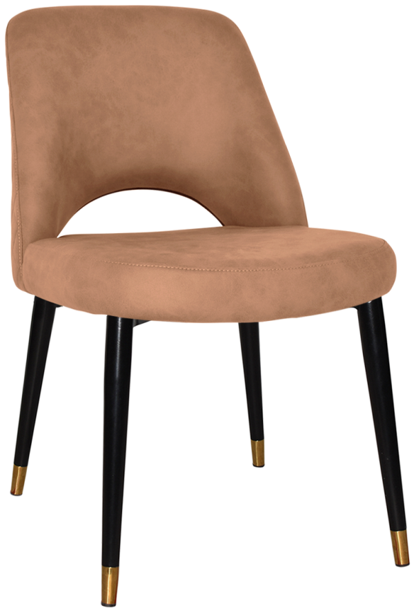 The Albury Black Brass Metal Leg Chair is a modern tan upholstered chair featuring a curved back and an open back design. It boasts black tapered legs with elegant gold accents at the tips, providing a minimalist and stylish look ideal for contemporary interiors.
