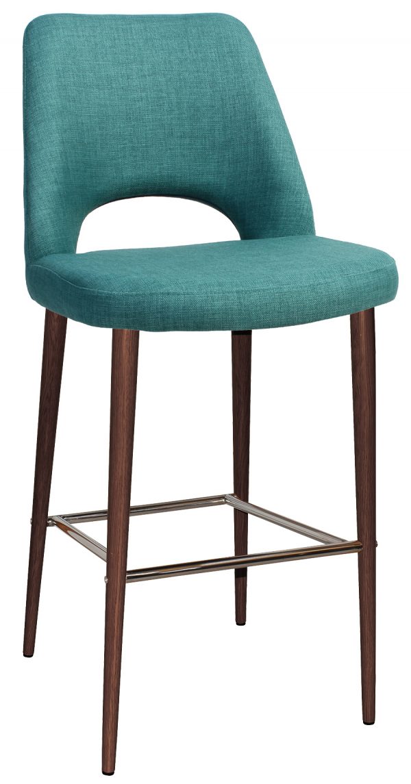 A modern bar stool with a teal upholstered seat and backrest. The backrest features an open lower section. The stool has four dark wooden legs and a metal footrest connecting the legs. The design combines contemporary style with comfort.