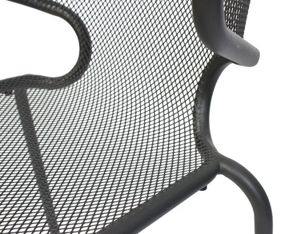 Close-up of a black metal mesh chair with curved edges and a modern design. The image focuses on the texture and pattern of the mesh backrest and seat, highlighting the chair's structural details.