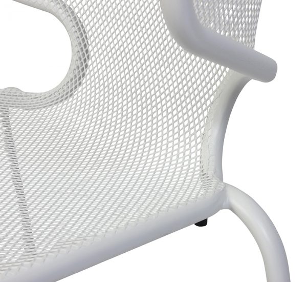 A close-up of a white metal mesh chair showing the armrest, part of the seat, and backrest. The chair has a modern design with a mesh-patterned surface, curved edges, and sturdy construction.