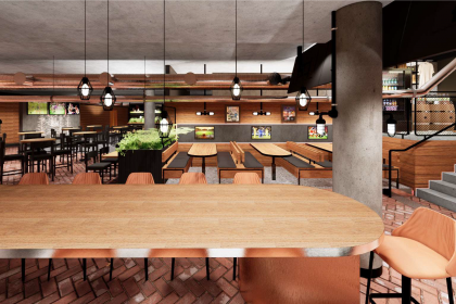 Modern indoor dining area with various seating options including a long communal table, bar-height chairs, and bench seating. The space is illuminated with pendant lights and features greenery. A staircase is visible on the right, and there's a contemporary decor throughout.