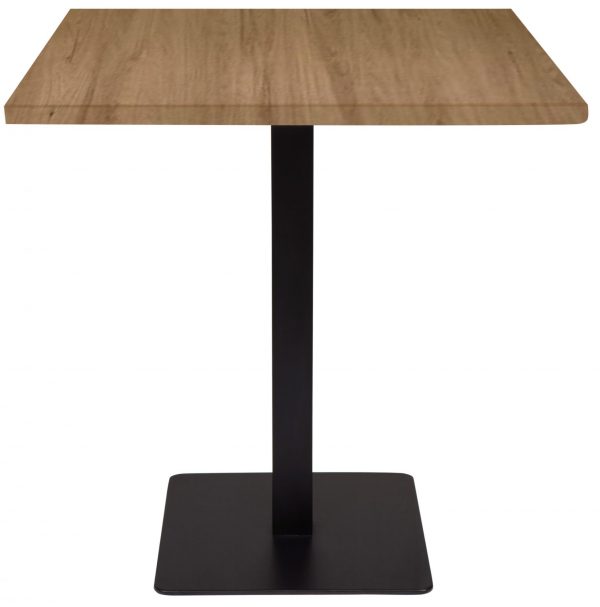 The Light Oak Top With Capri Base is a simple square wooden table with a light brown finish, featuring a single black metal pedestal base and a flat square base plate. The design is modern and minimalistic, set against a plain white background.