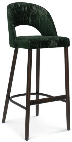 The Alora Barstool showcases a sleek, contemporary design with a dark green, velvet-textured upholstered seat and backrest, complemented by an open lower back. It stands firmly on four dark wooden legs that are interconnected by a circular footrest at the base for enhanced stability and comfort.