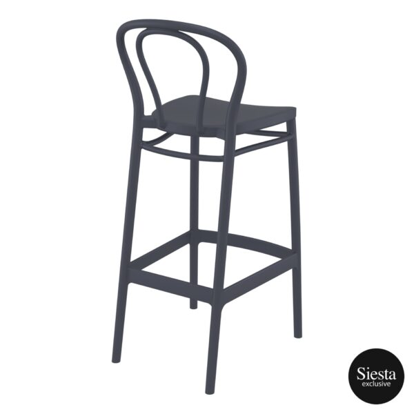 Introducing the Victor Barstool: a sleek and modern bar stool with a curved backrest and a dark, matte finish. It features four legs with footrests, designed for a minimalist aesthetic. The "Siesta exclusive" logo is proudly displayed in the lower right corner.