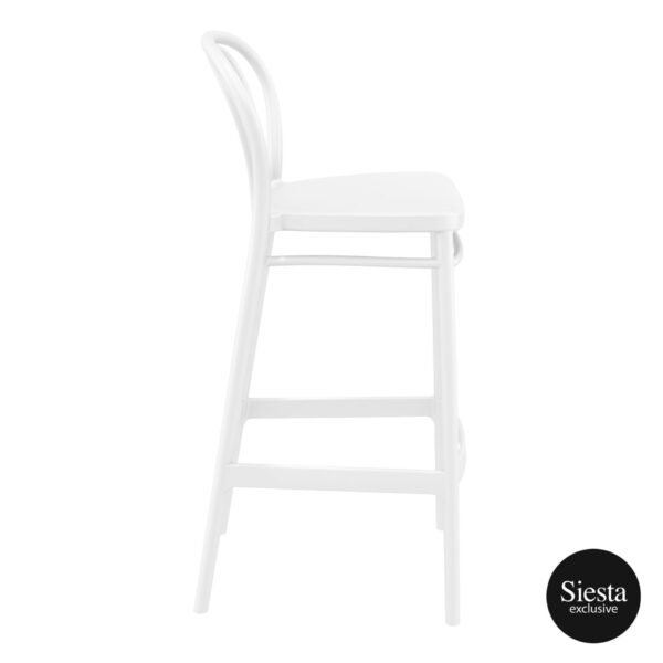 Side view of a tall, white Victor Barstool with a curved backrest and Siesta exclusive branding in the lower right corner. The sleek design features simple lines and a footrest for added comfort.