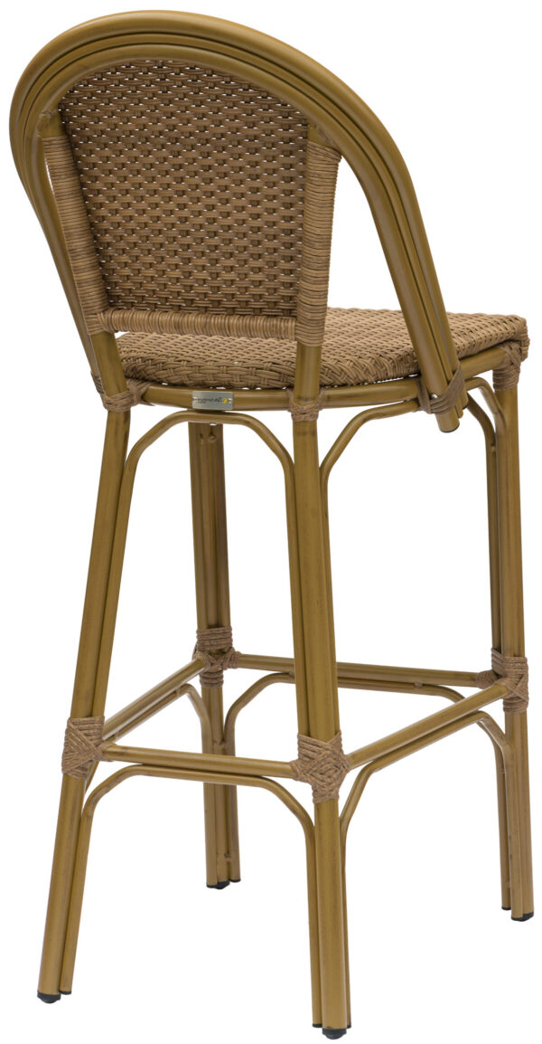 The Parisian Barchair Vintage Cane is a tall bar stool featuring a woven rattan backrest and seat, supported by a sturdy frame with a bamboo-like appearance. The stool includes a footrest and boasts a natural, earthy color scheme. It combines functionality with style, making it suitable for both indoor and outdoor use.